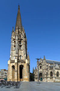 View of historical building against clear blue sky