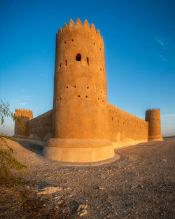 View of fort against blue sky