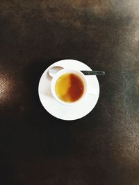 High angle view of coffee cup on table