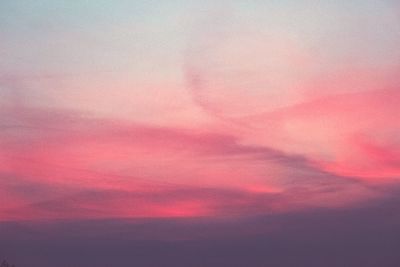 Close-up of pink rainbow against sky