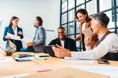 Business colleagues working in office