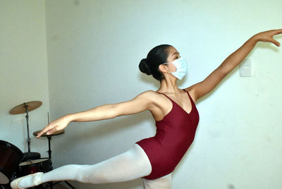 Dancer practicing indoors.