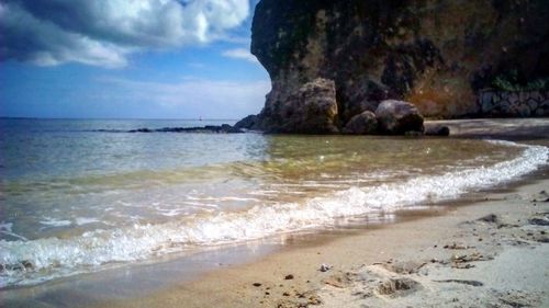 Scenic view of beach against sky