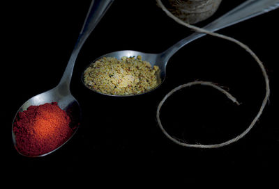 High angle view of food on table against black background