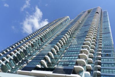 Low angle view of modern building against sky