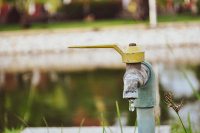 Close-up of fire hydrant on field