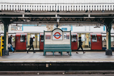 Station name sign on the outdoor platform of golders green tube station, london, uk