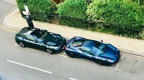 High angle view of cars parked on road