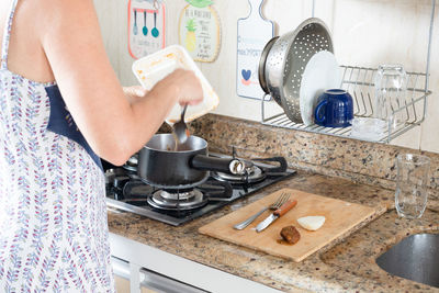 Woman in the kitchen preparing food. healthy eating.