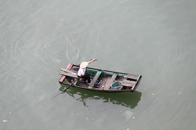 High angle view of person rowing boat in river
