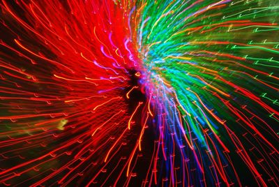 Full frame shot of firework display at night