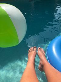 Low section of woman in swimming pool