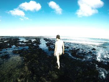 People standing on beach