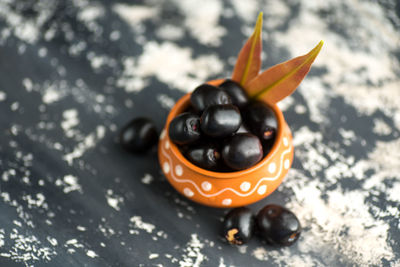 Close-up of orange fruit on table