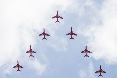 Low angle view of airplane flying in sky