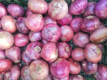 Full frame shot of onions for sale at market stall