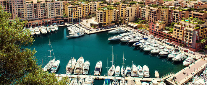 High angle view of boats moored at harbor