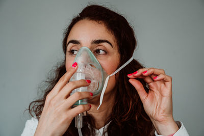 Portrait of a woman drinking glass