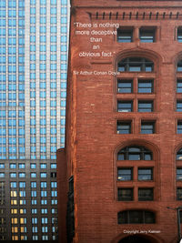 Low angle view of text on building