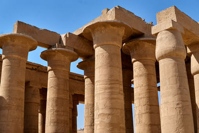 Low angle view of old ruins against clear sky