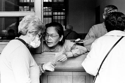 Group of people sitting at home