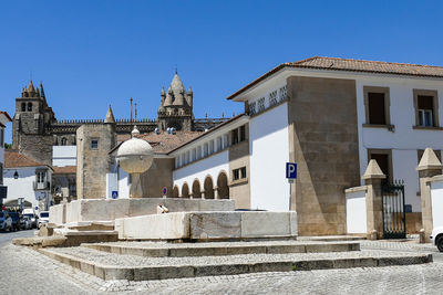 Buildings against blue sky