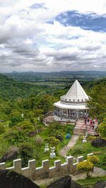 Scenic view of landscape against cloudy sky