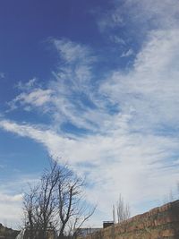 Low angle view of built structure against blue sky