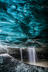 The wonderful colors of blue ice in the ice caves of vatnajokull, europe's largest glacier