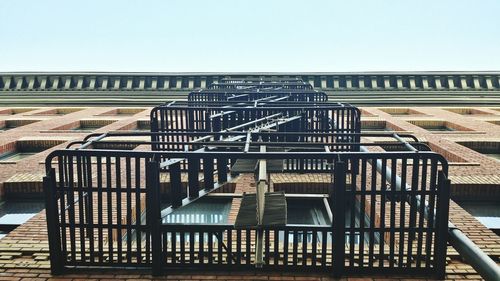 Low angle view of building with fire escape