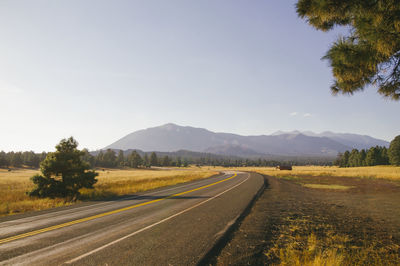 Road passing through field