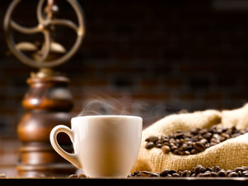 Close-up of coffee cup on table