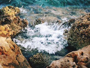 Stream flowing through rocks