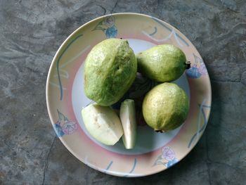 High angle view of fruits in bowl on table