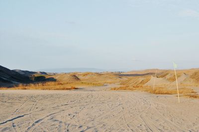 Scenic view of desert against sky