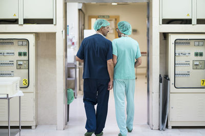 Two surgeons talking in hospital