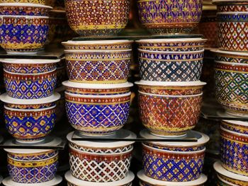 Stack of multi colored for sale at market stall