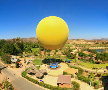 High angle view of hot air balloon against blue sky