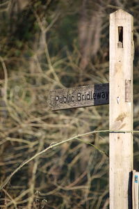 Close-up of wooden post on fence