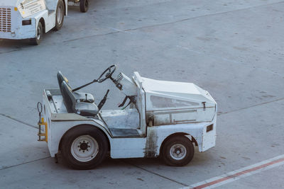 High angle view of vehicles on road by building