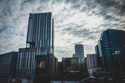 Low angle view of skyscrapers against sky