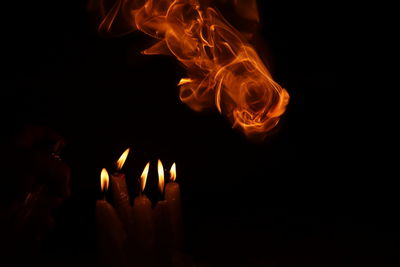 Close-up of fire against black background