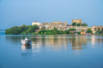 Townscape of capodimonte, ancient village on a promontory on the bolsena lake, lazio, italy