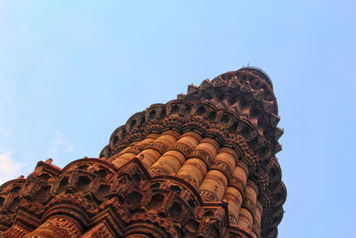 Low angle view of historical building against clear blue sky