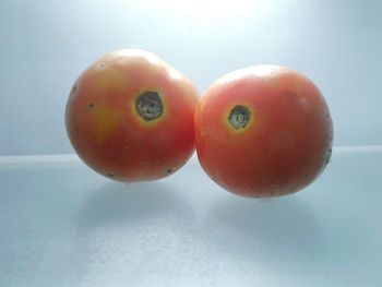 Close-up of oranges on table