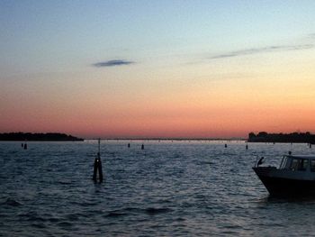 Scenic view of sea at sunset