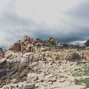 Rock formations on landscape against sky