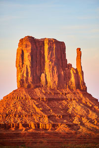 Rock formations on mountain against sky