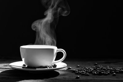 Close-up of coffee cup on table