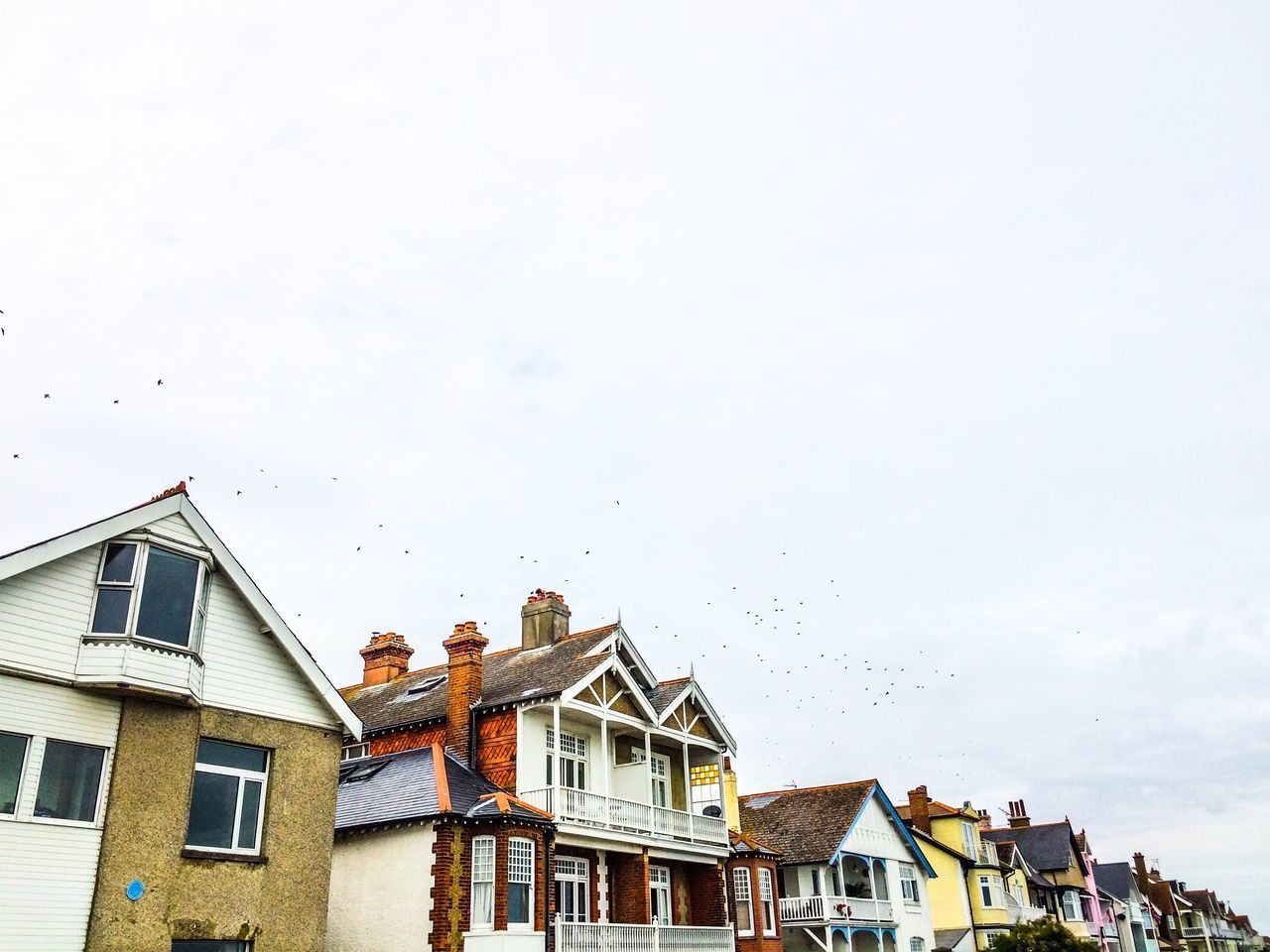 architecture, built structure, building exterior, house, sky, day, waterfront, high section, no people, multi colored, development, residential district